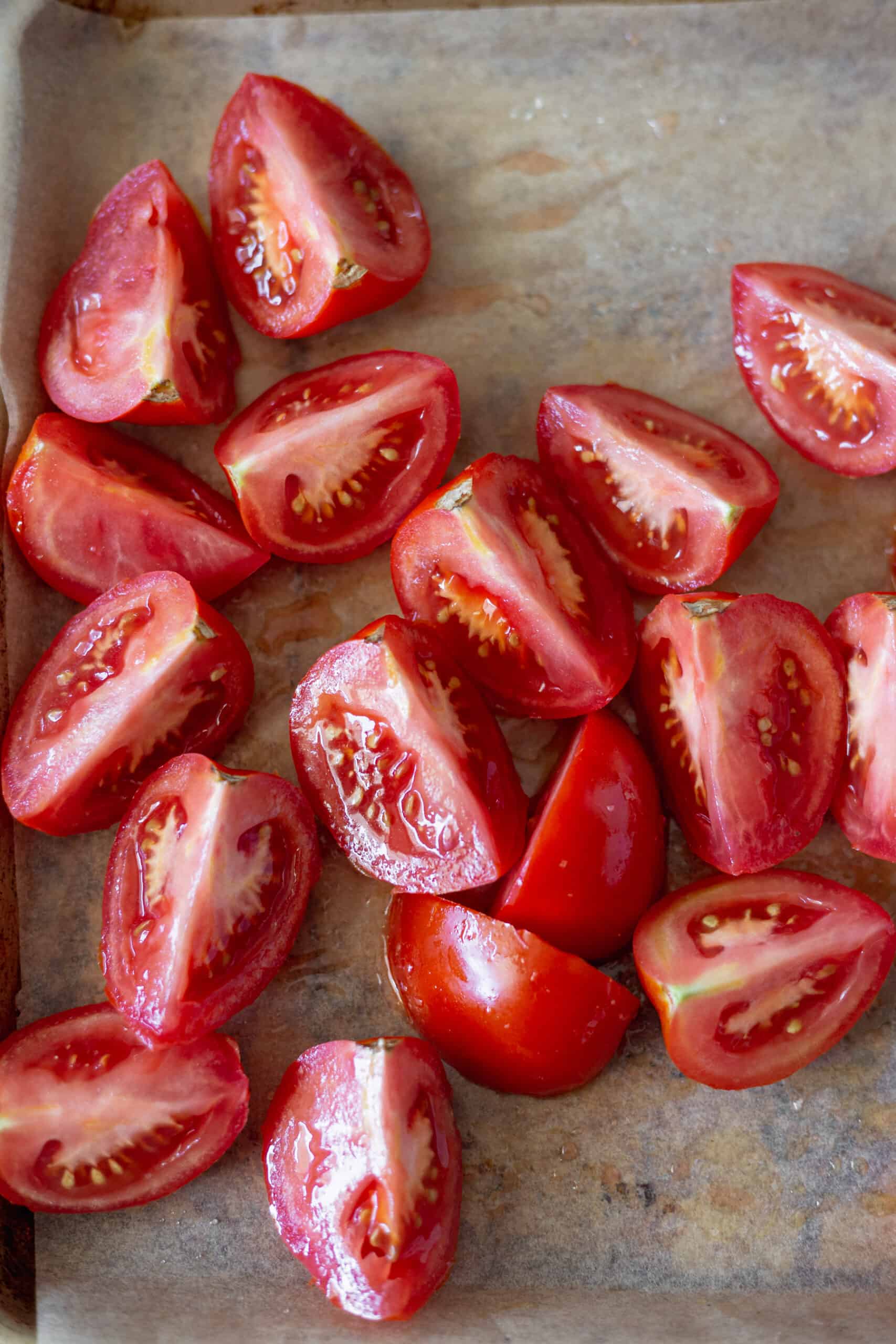 Fresh large tomatoes chopped and drizzled in olive oil and salt