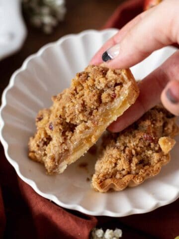 Inside of an apple crumble tartlet