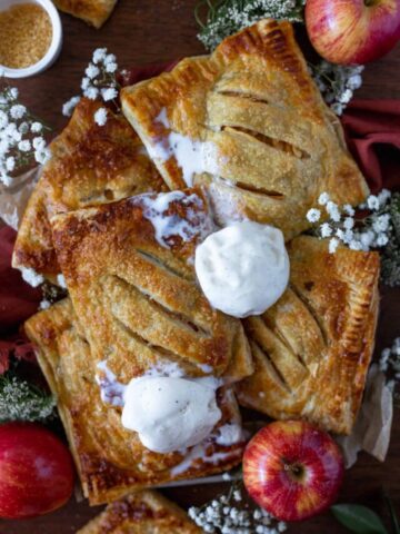 Apple hand pies topped in melty vanilla ice cream