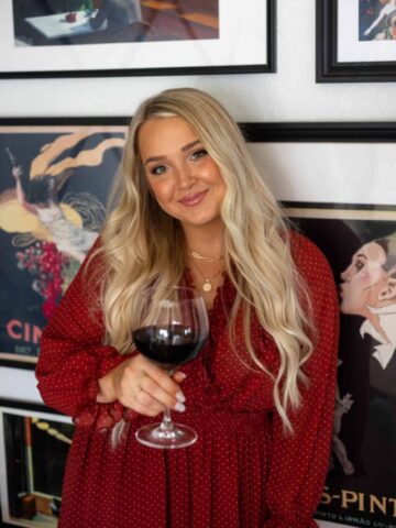 Picture of a blonde woman in a red dress