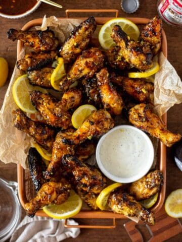 Large platter of hot honey lemon pepper wings with ranch