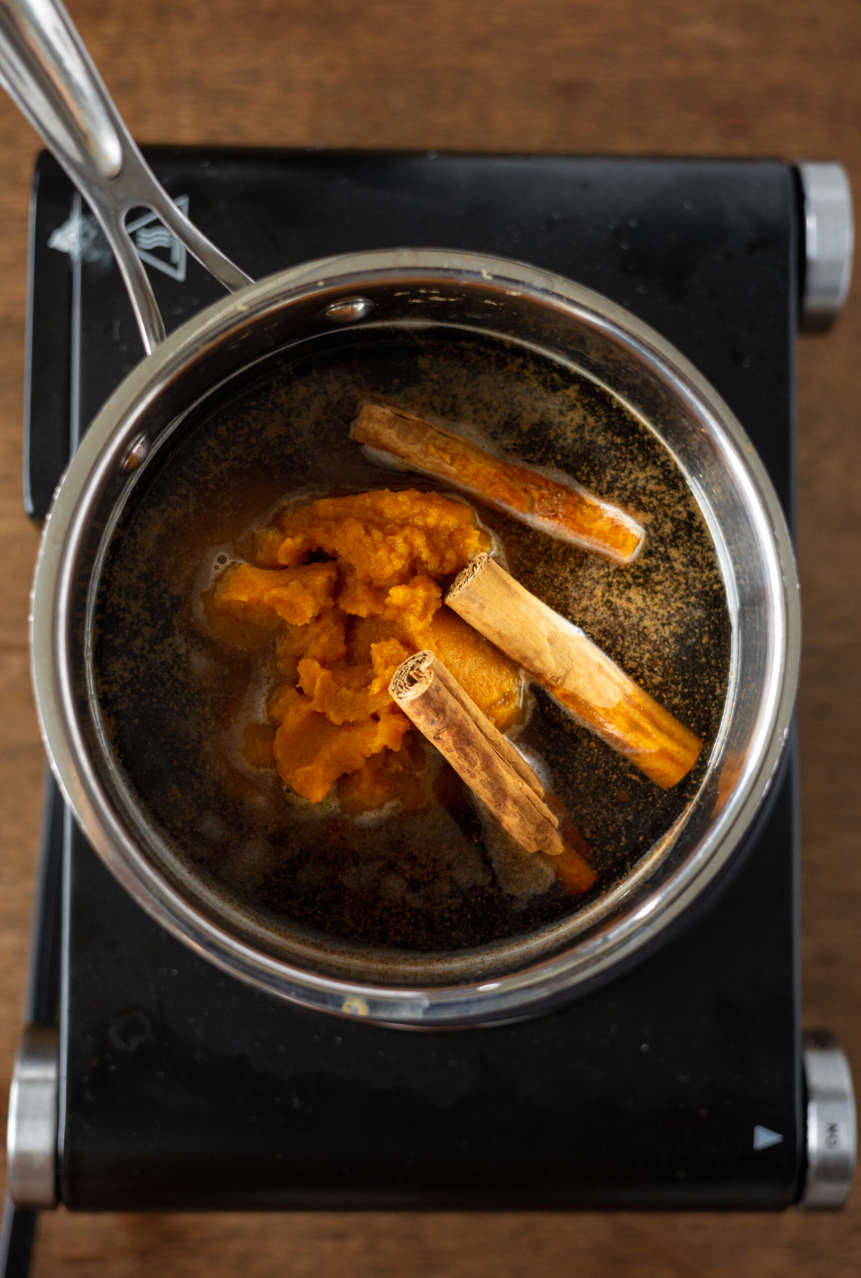pumpkin spice ingredients in a sauce pan