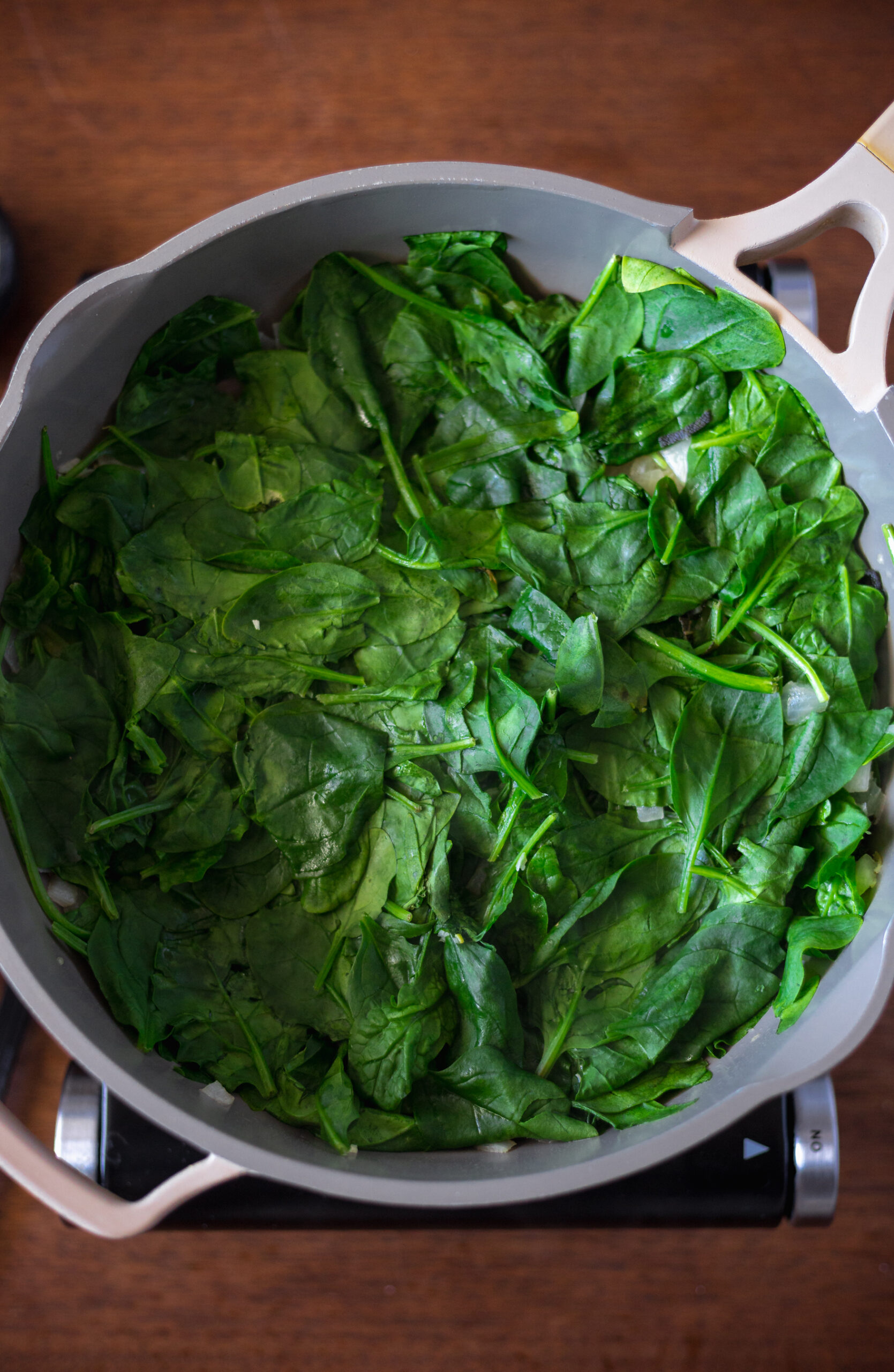 Wilted spinach in pan