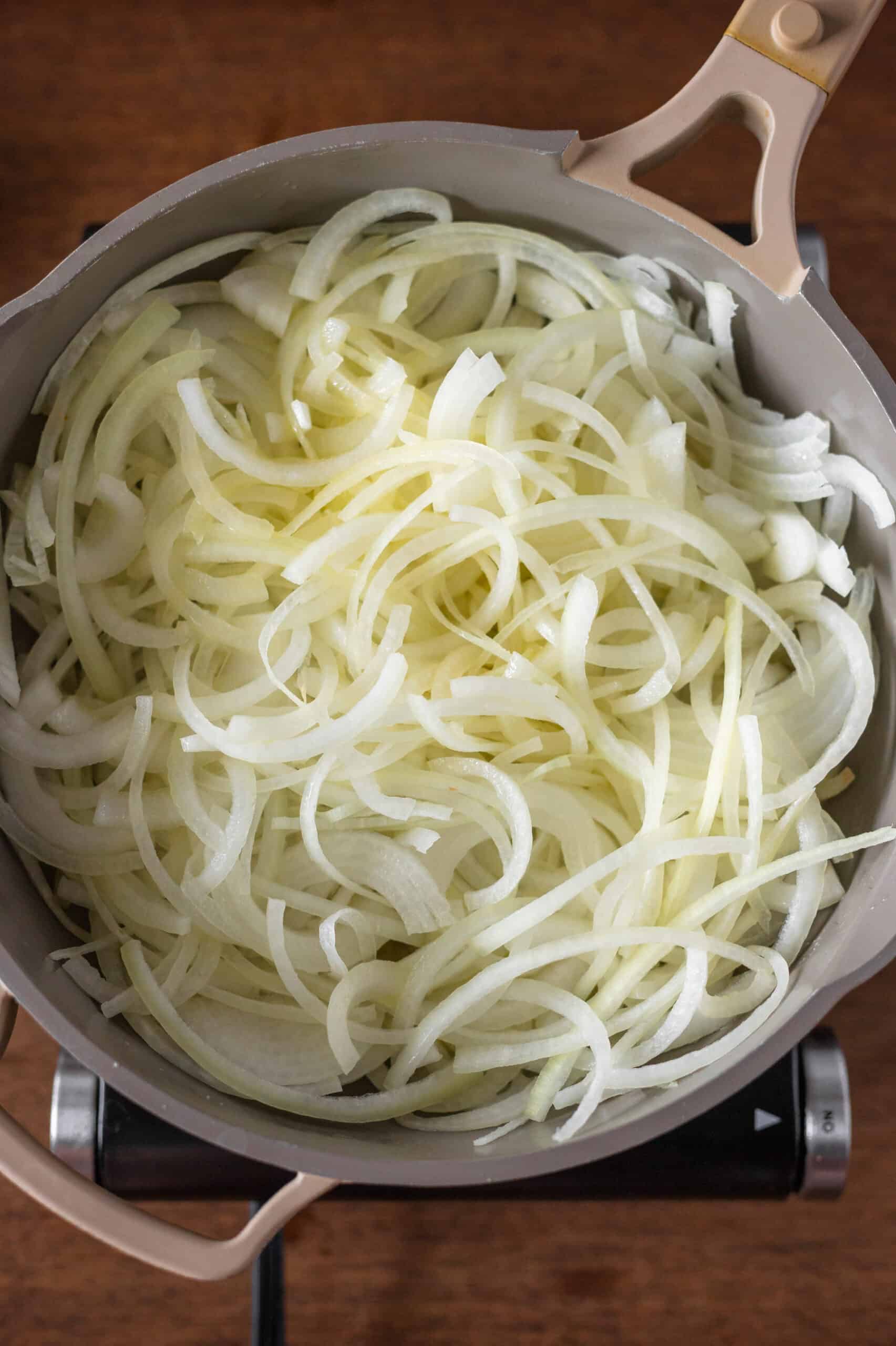 Onions added to a pan